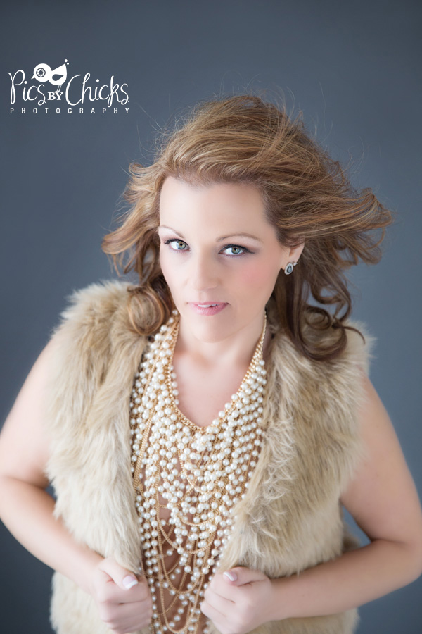 Boudoir Photo with woman in fur vest and pearl necklace.  Pittsburgh Boudoir Photographer - www.PicsByChicksPhotography.com