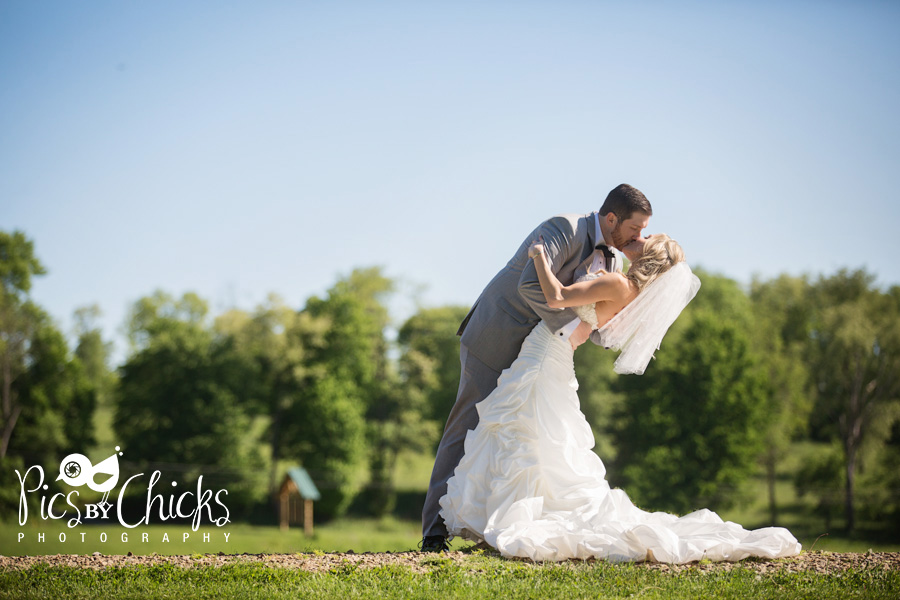 Beautiful wedding photo at The Gathering Place at Darlington Lake, groom dips bride, www.PicsByChicksPhotography.com - Pittsburgh Wedding Photographer -