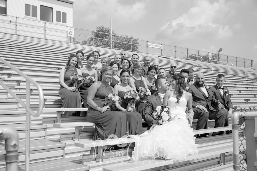 large wedding party wedding photo on high school bleachers, pittsburgh wedding photographer