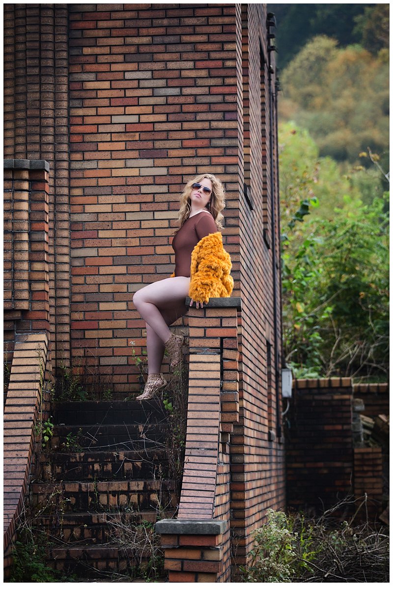 sexy and intimate outdoor boudoir photo of fur jacket and brown bodysuit sexy and intimate outdoor boudoir photo of fur jacket and brown bodysuit