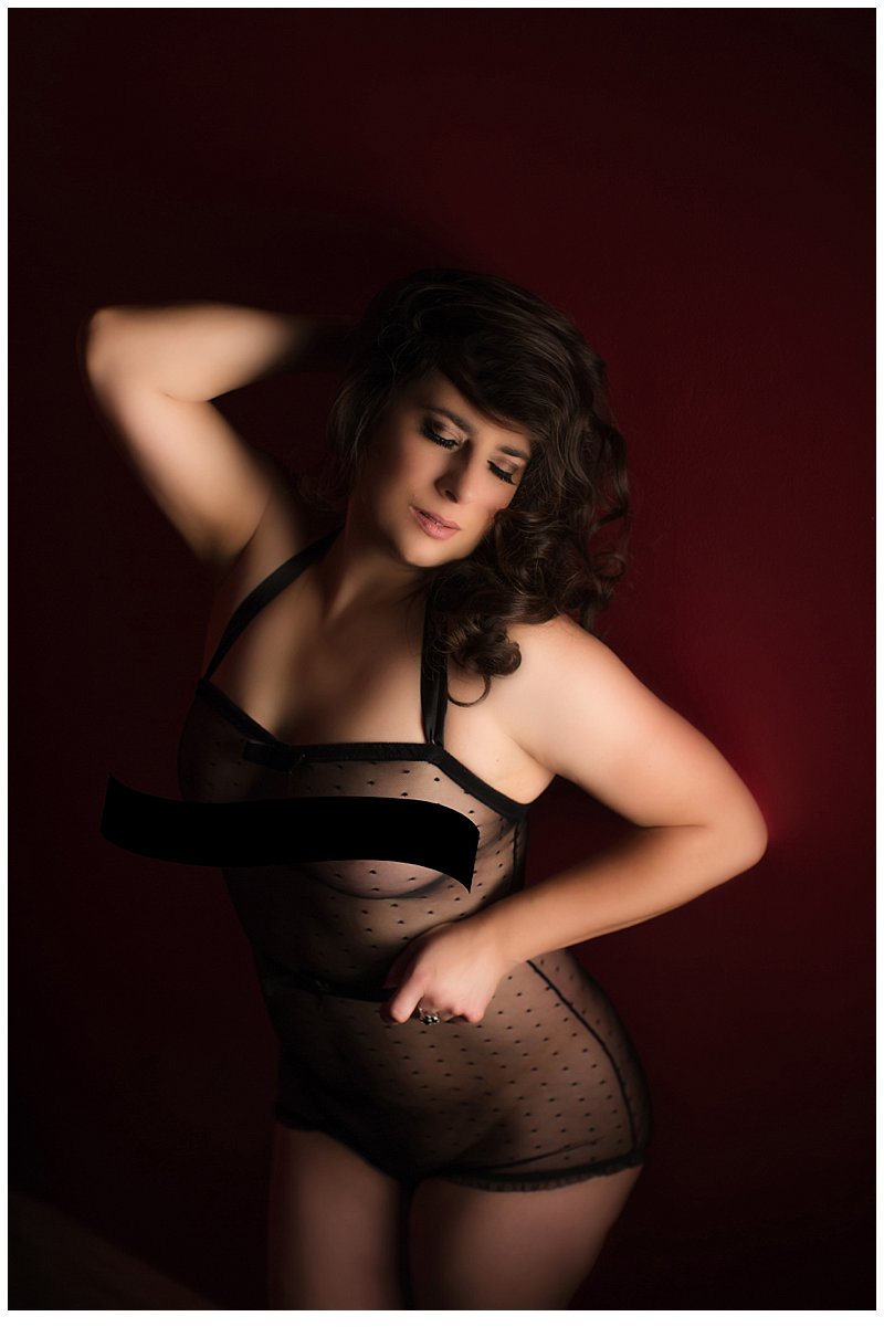 Boudoir photos in pittsburgh with client in custom black lingerie
