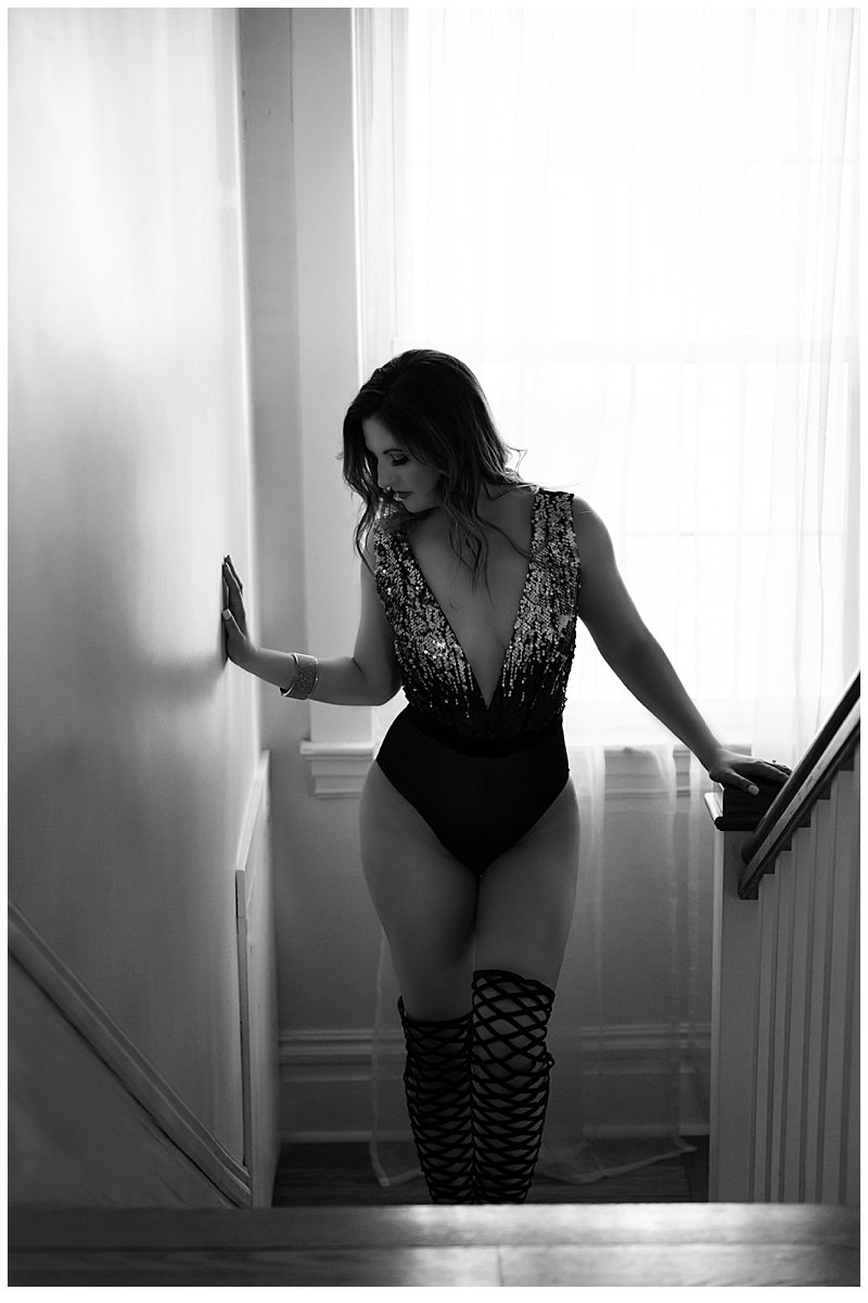pittsburgh boudoir woman in black boots on stairs at pics by chicks photography pittsburgh boudoir woman in black boots on stairs at pics by chicks photography