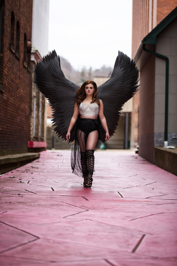 sexy photos pittsburgh woman walking with black wings and rhinestone bra sexy photos pittsburgh woman walking with black wings and rhinestone bra