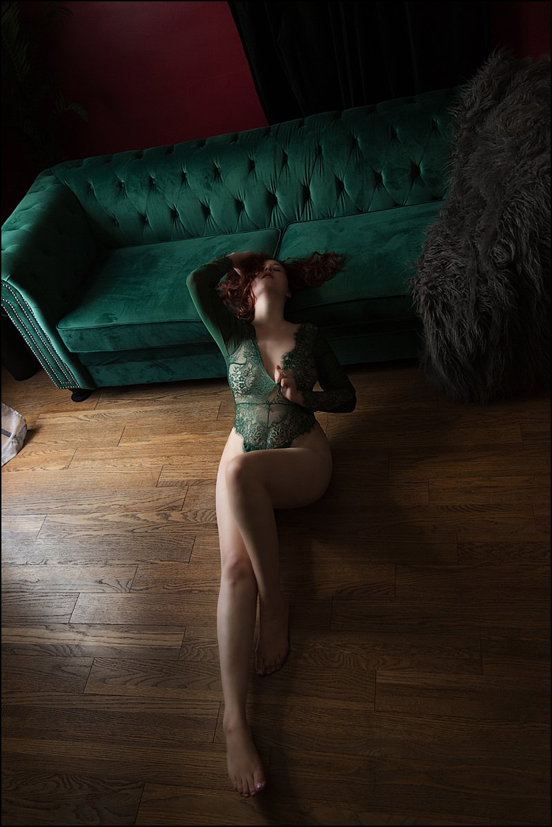 boudoir photos pittsburgh woman on green sofa in lace bodysuit boudoir photos pittsburgh woman on green sofa in lace bodysuit