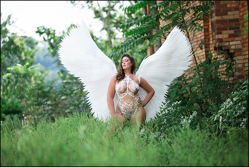 white fantasy wings photo shoot in pittsburgh PA for boudoir photo shoot
