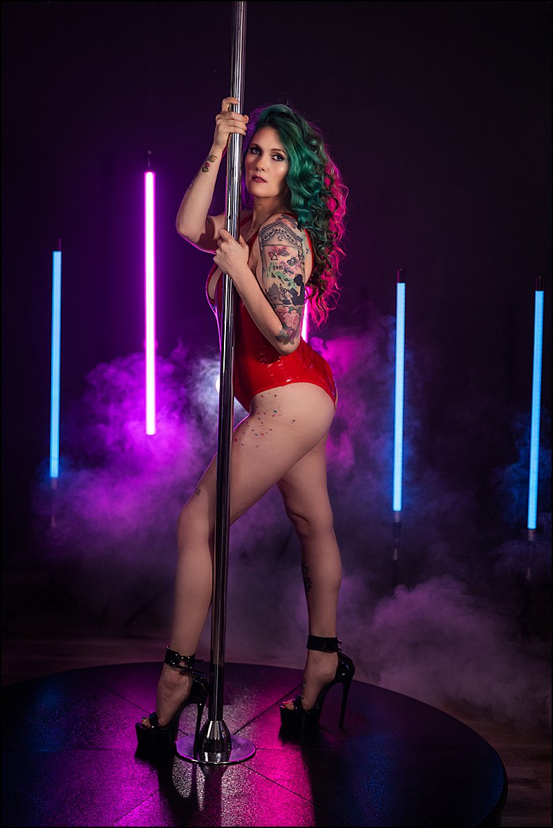 pittsburgh boudoir photos with dancer pole in boudoir studio, red latex lingerie with neon lights photo shoot, boudoir photography pittsburgh