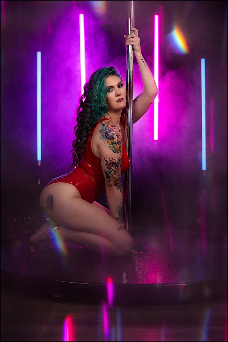 pittsburgh boudoir with dance pole and neon lights in red latex lingerie bodysuit, best boudoir photographer pittsburgh, boudoir photography pittsburgh