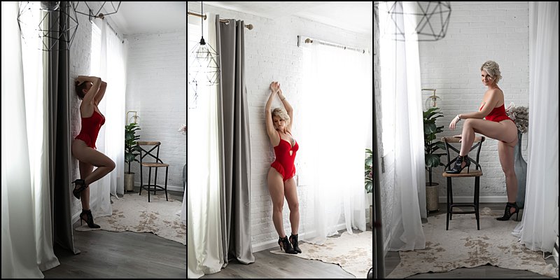 red lingerie photo shoot pittsburgh, boudoir images of woman posing on wall in red lingerie, pittsburgh's best boudoir photographer