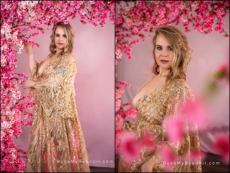 self love photo shoot pittsburgh, cherry blossom photo set at pittsburgh boudoir studio, woman in gold lace gown with flowers