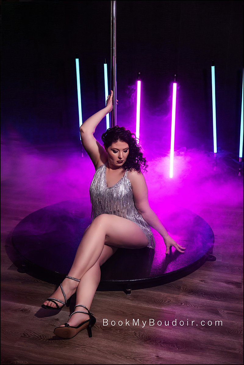 boudoir photos Pittsburgh, dancer photo shoot, boudoir studio with stripper pole, plus size boudoir in lingerie with dancer pole and neon lights