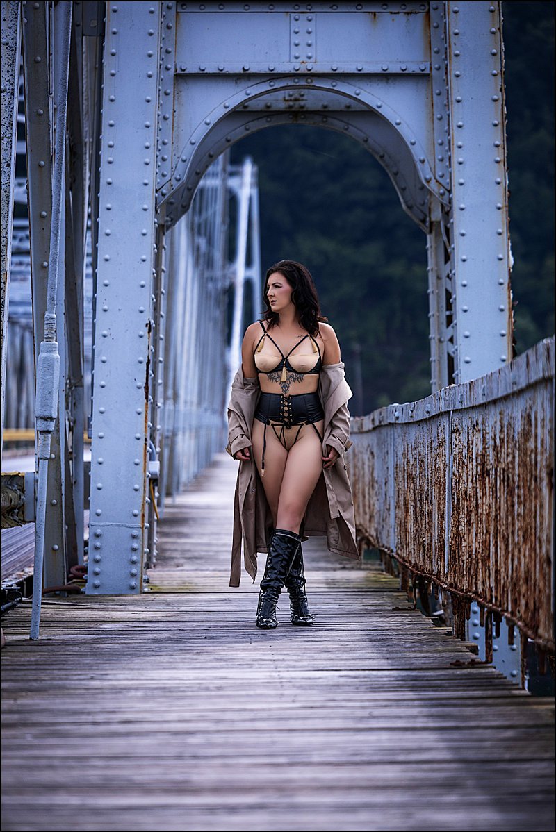 boudoir photography pittsburgh with woman posing on bridge in sexy lingerie with a trench coat, Maura Chick photo shoot