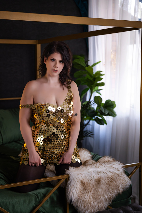 pittsburgh boudoir photos in studio on gold bed with green satin sheets, gold lingerie disc dress pittsburgh boudoir photos in studio on gold bed with green satin sheets, gold lingerie disc dress
